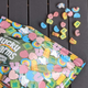 Bag of Lucky Charms Just Magical Marshmallows spilling out on table